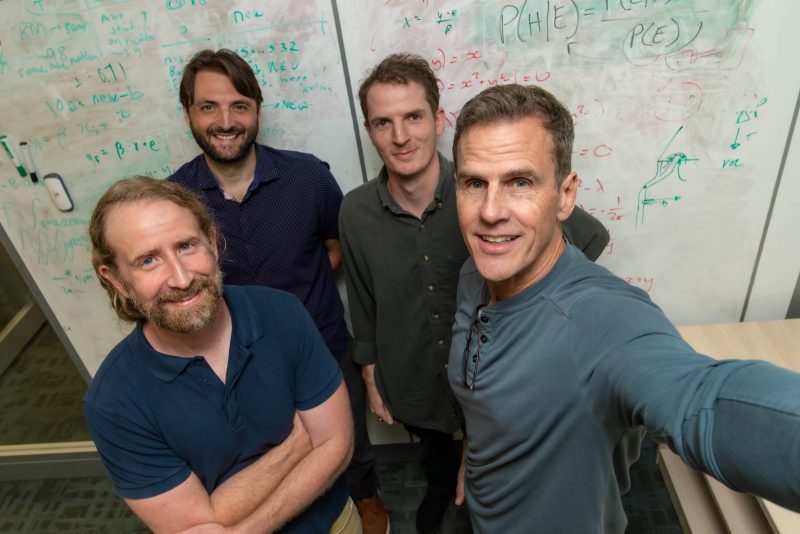 (Front row, from left) William “Matt” Howe and Read Montague are senior authors of a study published in Nature Communications that identified a neurochemical signature distinguishing Parkinson’s disease from essential tremor. With them are (back row, from left) Alec Hartle, neuroscience doctoral student, and Paul Sands, research assistant professor at the Fralin Biomedical Research Institute at VTC. Photo by Clayton Metz for Virginia Tech.